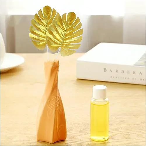 12 Pieces Artificial Palm Leaves, Golden Faux Tropical Monstera Leaves for Safari Jungle Hawaiian Luau Party, Table and Wall Decorations - size: 12.2x5.9 in